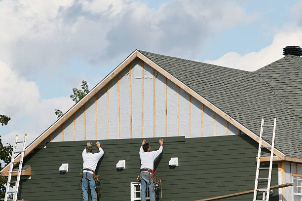 Professional Siding Contractor technician working in Roslyn Heights, NY